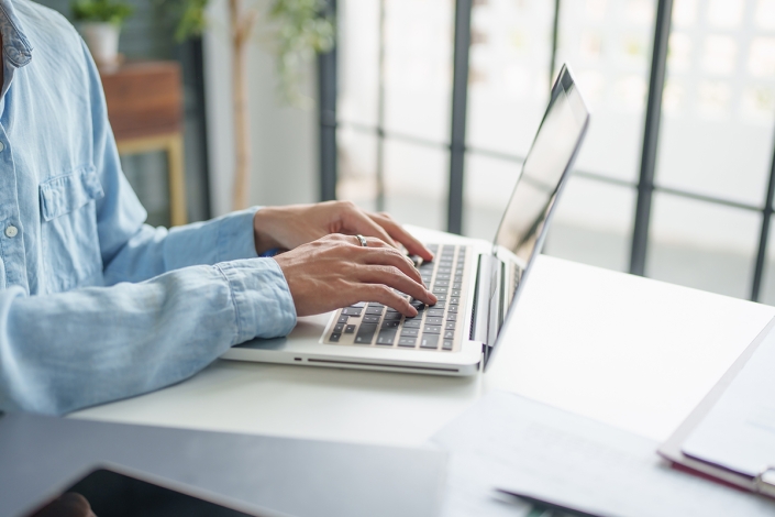 Business,Man,Working,With,Laptop,Hands,Typing,Keyboard.,Professional,Investor