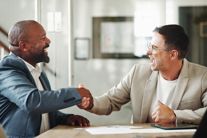 Businessmen,,Meeting,Or,Winning,With,Handshake,For,Business,Success,,Partnership